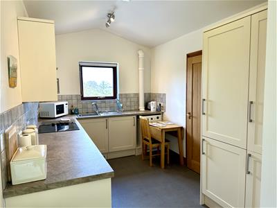 OPEN PLAN KITCHEN ARRANGEMENT